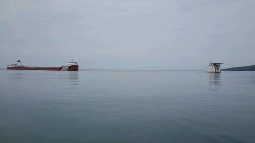 The motor vessel Roger Blough sits grounded just off of Gros Cap Reefs Light in Whitefish Bay, Lake Superior, May 27, 2016. (U.S. Coast Guard photo by Samantha Coonan)