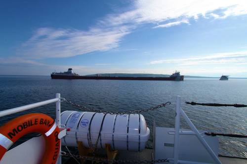 Roger Blough sits grounded in the vicinity of Gros Cap Reefs Light in Whitefish Bay, Lake Superior, May 29, 2016, as seen from the deck of Coast Guard Cutter Mobile Bay. (U.S. Coast Guard photo courtesy Coast Guard Cutter Mobile Bay)